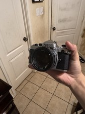 Nikon FE Sliver 35mm Film Camera With 50mm Ai Lens