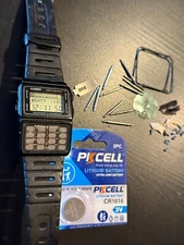Casio 676 DBC- 61 1985 Vintage Original Databank Watch New Battery Misc parts