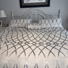 King size Comforter with 2 king pillow shams and one oblong decorative pillow.