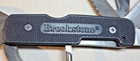 Brookstone Multi-Tool Black Handle Stainless Steel Pliers Saw Knife Screwdriver — photo 2