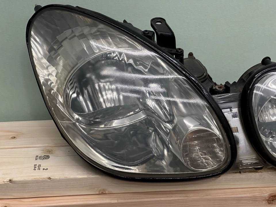Par de carcasas de faros halógenos OEM para Lexus GS300 GS400 GS430 1998-2005 Foto 2 de 4