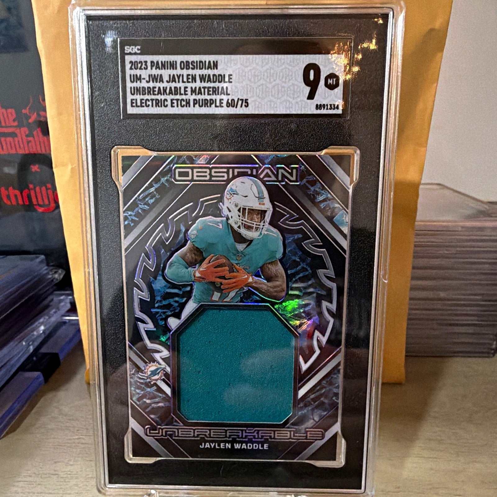 Panini 2023 Obsidian Unbreakable Memorabilia Jaylen Waddle Purple UM-JWA 60/75
