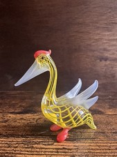 Yellow Swirl Glass Pelican Ornament.