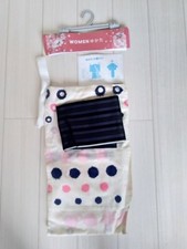 Uniqlo's used yukata and dark blue obi with polka dots on a white background