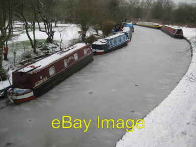 Photo 6x4 Frozen in Canal Boats The narrowboats locked in the ice were ju c2012