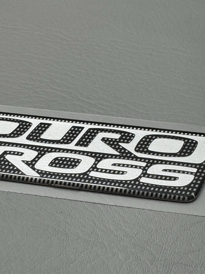 Mitsubishi Raider Duro 2006-2009 emblema de puerta lateral cruzada logotipo insignia usado fabricante original Foto 4 de 4