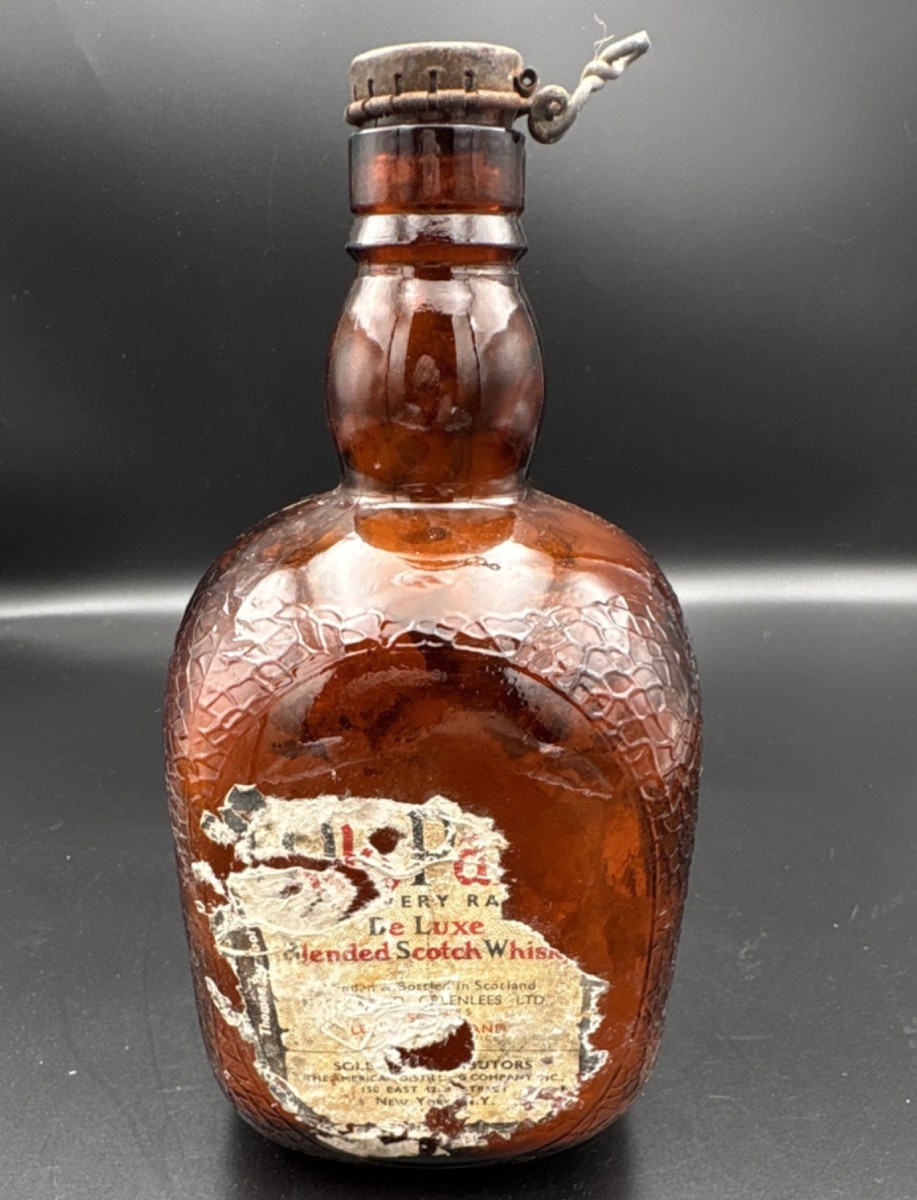 Vintage Old Parr De Luxe Blended Scotch Whisky Amber Glass Bottle