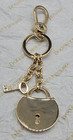 Dooney & Bourke Gold Metal Key Chain Lock Key Medallion Accent--NEW-READ!! — photo 6