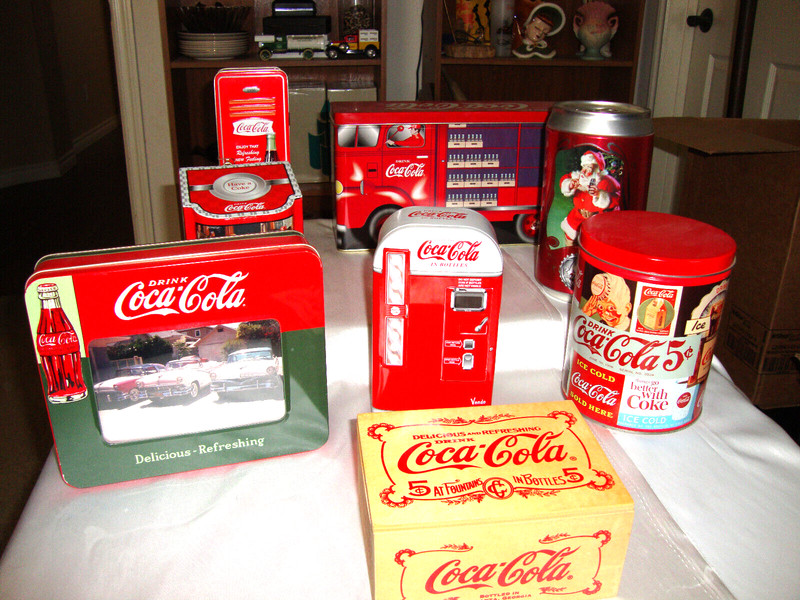 Lot of Seven Coca Cola Vintage Tins Plus A Wooden Coca Cola Box