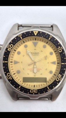 Vintage Casio Alarm Chronograph Analog-Digital Dive Watch Gold Dial AMW-320C