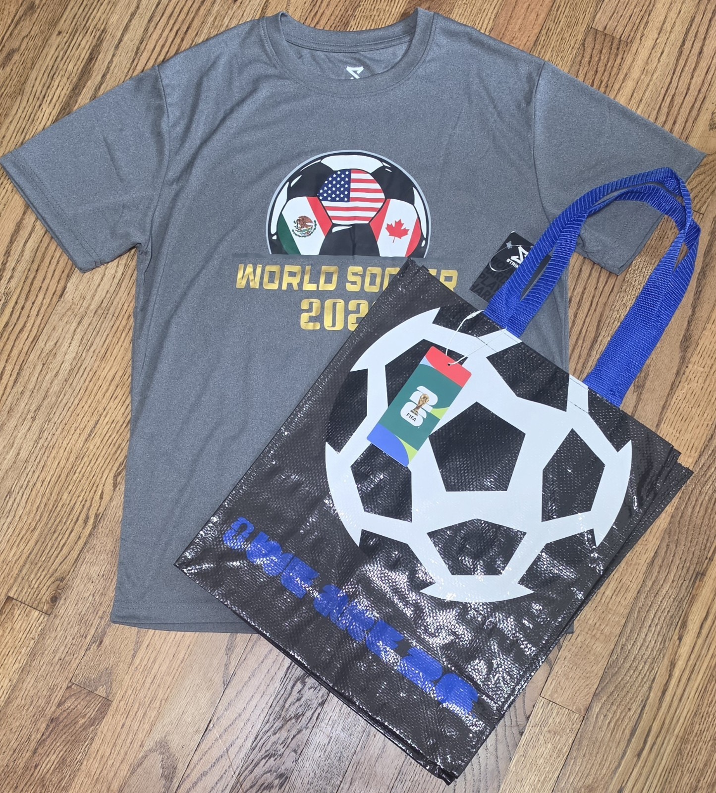 Striker World Soccer 2026 USA Mexico Canada Men's MED Gray Performance T-Shirt 