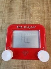 Red Mini Etch A Sketch drawing toy