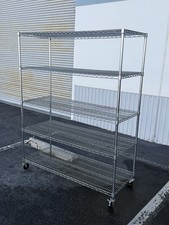 Used Storage shelves racks with wheels