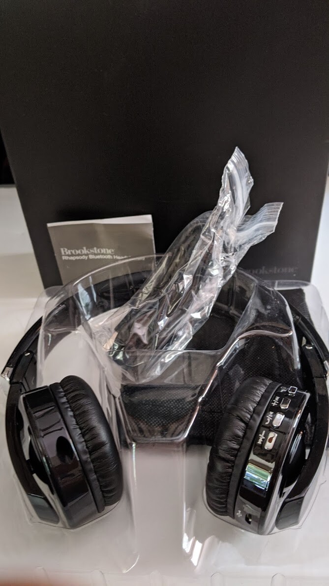 Brookstone Rhapsody Bluetooth Headphones New in Box with USB Cable and Storage Bag