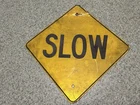 VINTAGE METAL SIGN OLD  REFLECTIVE SLOW ROAD SIGN SMALL RARE SIZE SLOW SIGN