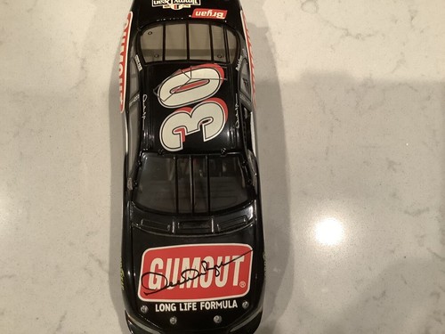 DERRIKE COPE AUTOGRAPHED 1998 PONTIAC GRAND PRIX GUMOUT DIECAST & CARD