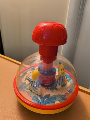 Redbox Vintage Toy Push & Spin Bananas Pajamas.  9'' tall, 7'' diameter