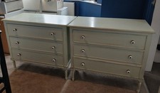Two matching Chests of drawers. Light green 3 drawers. Decorative handles.