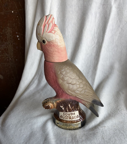 This is a vintage 1979 Jim Beam South Australia Galah Cockatoo