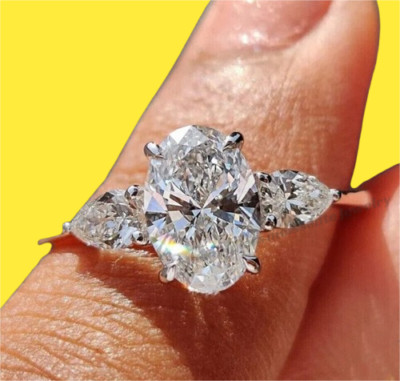 2.70 Ctw Oval Cut Moissanite Three Stone Engagement Ring 14K White Gold Plated
