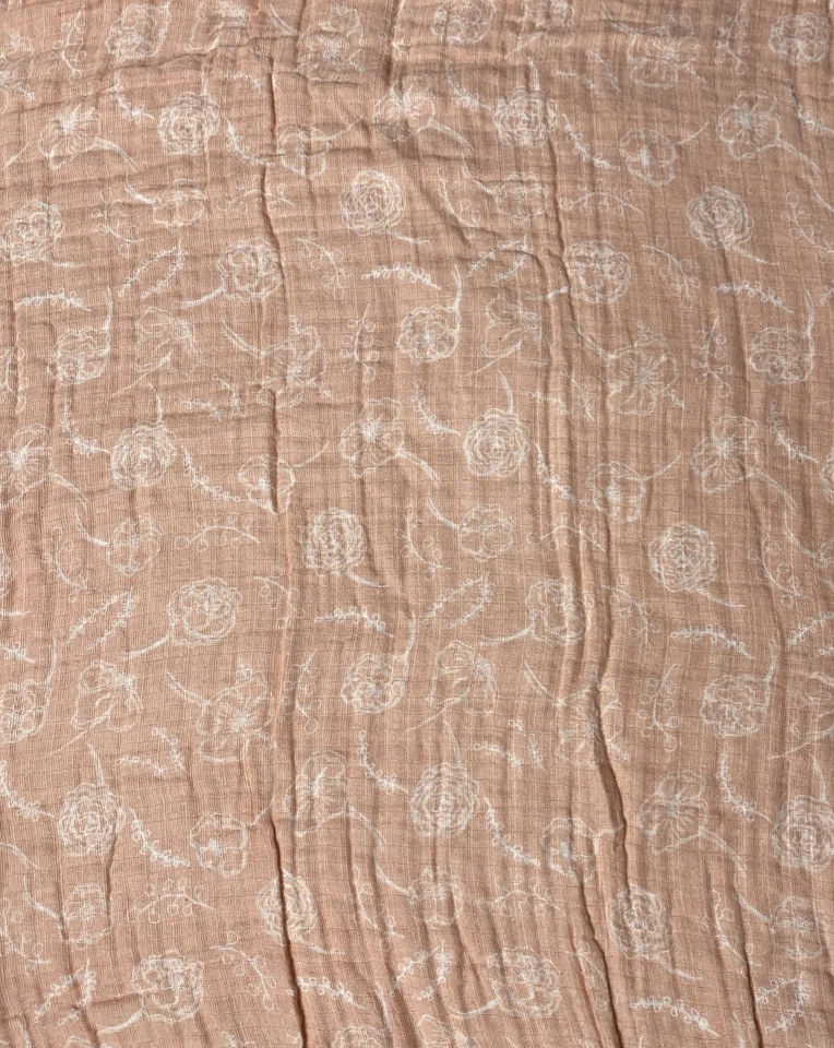 Manta de bebé floral color melocotón Aden & Anais flores blancas muselina algodón envoltura Foto 3 de 4