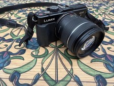 Panasonic Lumix DMC GX1 Mirrorless Camera + 14–42mm Power Zoom Lens + Batt Charg