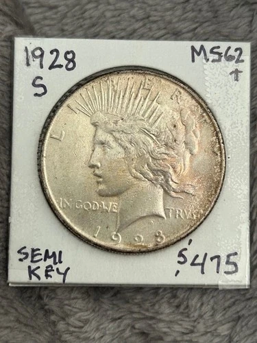 Semi-Key 1928-S PEACE DOLLAR.  UNC and NEVER CLEANED. Lightly toned.