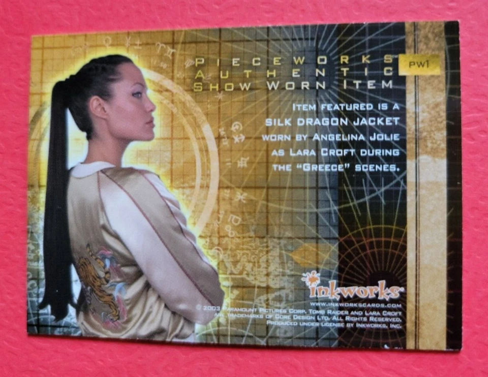 ANGELINA JOLIE TOMB RAIDER LARA CROFT WORN SILK DRAGON JACKET COSTUME RELIC CARD - Image 2 of 2