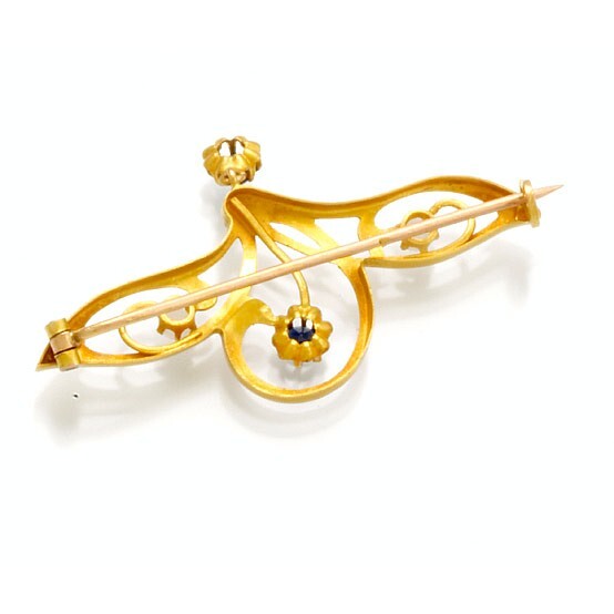 Broche en or gris 18K 750 millièmes de style Art Déco, de