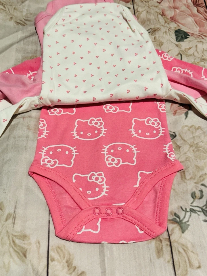 Conjunto de 3 mono manga larga Hello Kitty lunares rosa y blanco 3 meses nuevo con etiquetas Foto 3 de 4