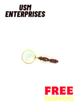 8" Brass Magnifier with a Wooden Handle, commonly used as a magnifying glass.