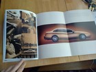 Original 2002 Saturn L-Series Sales Brochure + spec sheet, service leaflets, key — photo 3