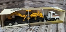 Juego de transporte de construcción Ertl John Deere juguete escala 1:25 retroexcavadora remolque camión