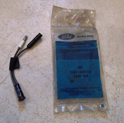 NOS 1983-1989 FORD Back Window Heat Control Warning Lamp E3DZ-18C622-A 84 85 86