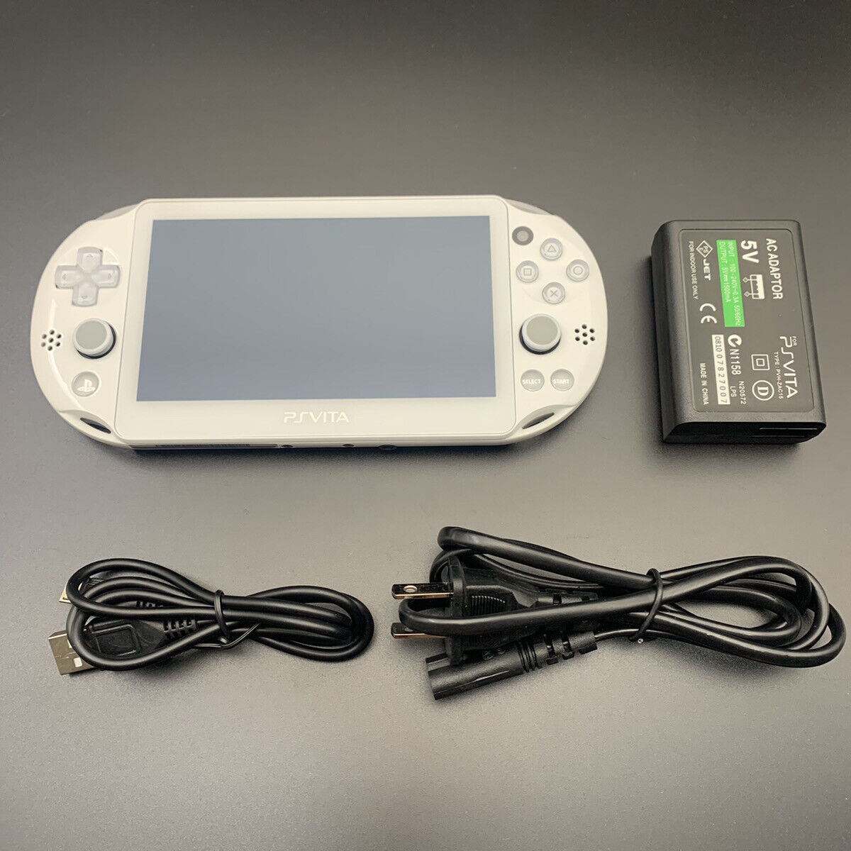 PS Vita PCH-2000 Sony Playstation Console only Choice Charger Used  (Excellent+)