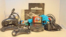 Sega Genesis CDX w/ 3 controllers, Konami lig...