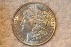 1889  BU MORGAN DOLLAR.