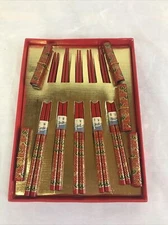 A VINTAGE JAPANESE / CHINESE SET OF 5 HAND PAINTED CHOPSTICK WITH STANDS IN BOX