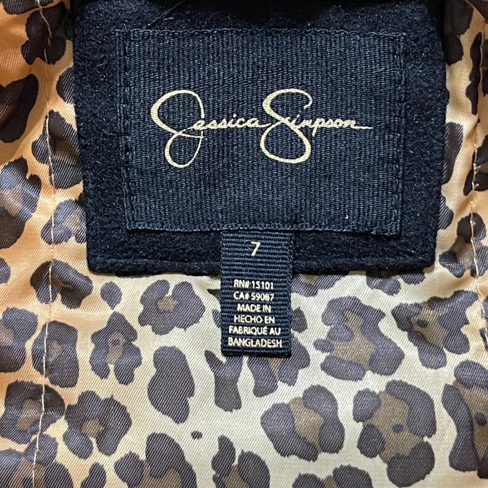 Abrigo para niña Jessica Simpson talla 7 ribete de piel sintética capucha estampado animal forrado negro Foto 3 de 4