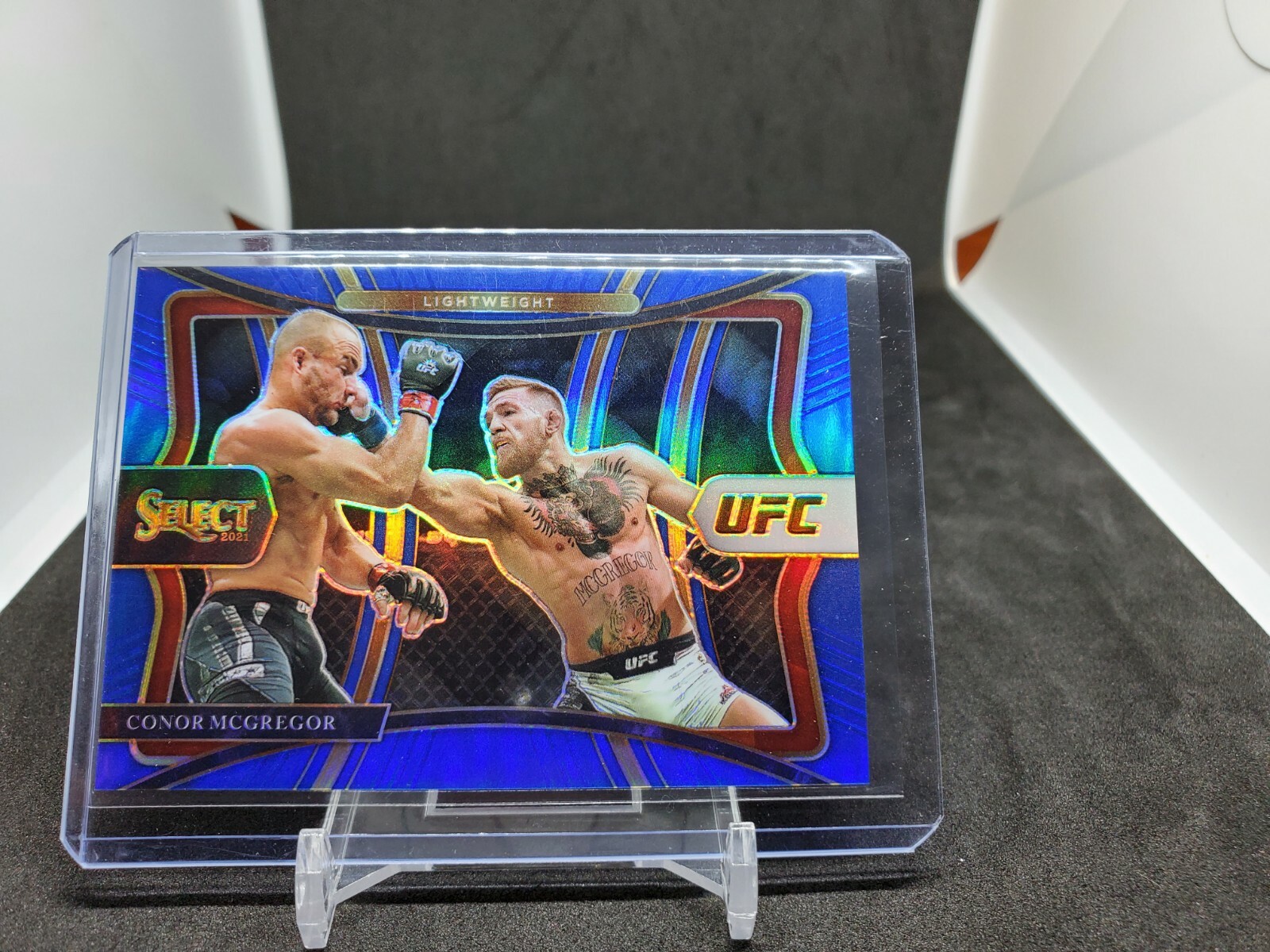 CONOR MCGREGOR 2021 SELECT UFC PREMIER LEVEL BLUE PRIZM CARD SP RARE /49
