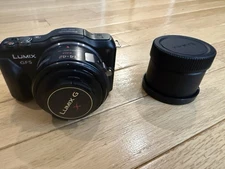 Panasonic Lumix DMC-GF5 with two lenses and battery, no charger