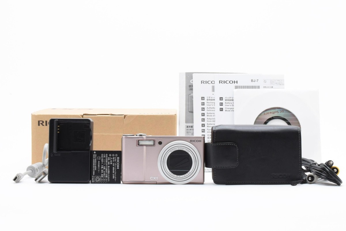 Near MINT RICOH CX1 Compact Digital Camera 9.2MP 7.1x