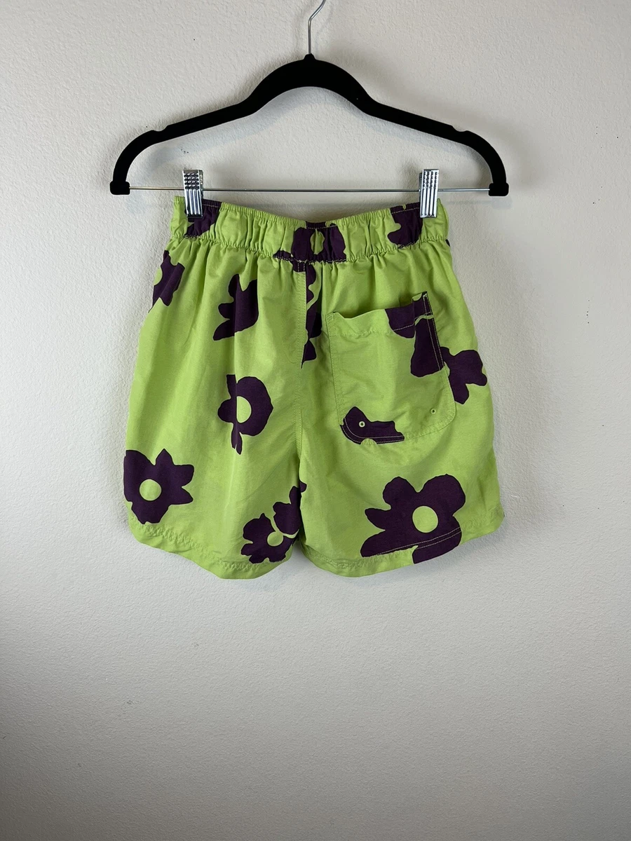 Green shorts with purple flowers 2025