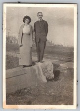 Vtg B&W Snapshot Standing Couple On Rock Rural Setting 1920s