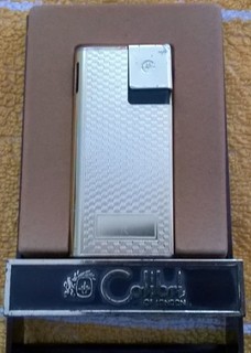 VINTAGE COLIBRI ELECTRONIC LIGHTER IN ORIGINAL CASE.