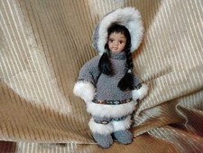 VINTAGE Eskimo doll  Or Ornament 7 Inches Porcelain W Movable arms and legs