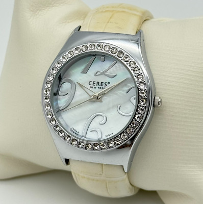 Women's CERES New York Silver Tone Crystal Bezel Bangle Watch, MOP Dial, White