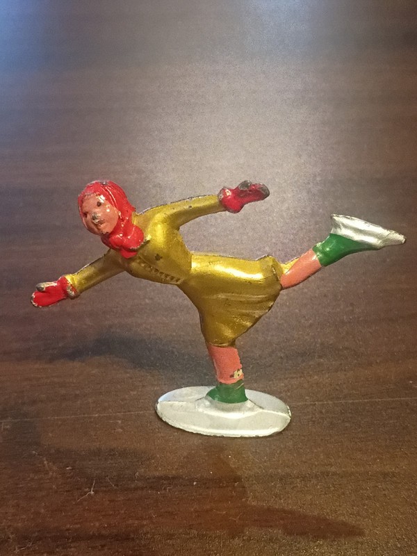 Vintage Barclay lead girl figure ice skater in gold excellent
