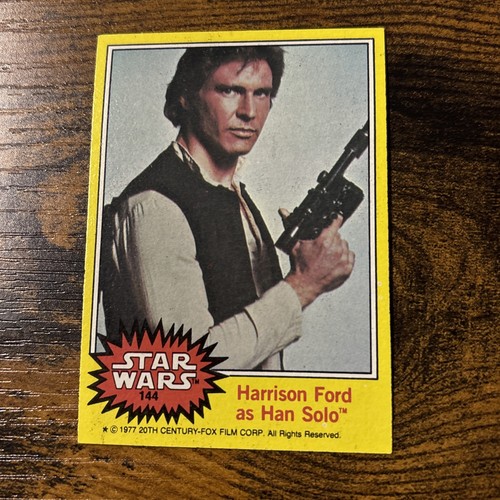 1977 Topps Star Wars #144 Harrison Ford as Han Solo — Raw