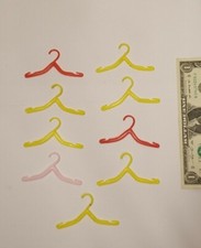 1960s LOT OF 9 VINTAGE PLASTIC BARBIE KEN Doll CLOTHES HANGERS